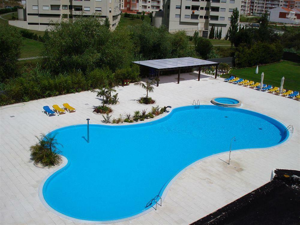 Malibu Foz Hotel - La Maison Younan Фигейра-да-Фош Экстерьер фото Swimming pool in the complex